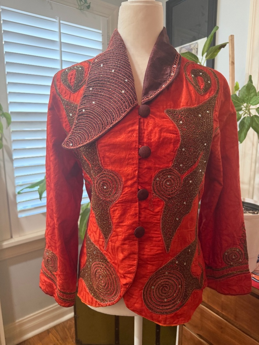 Unique, handmade orange embroidered jacket.
